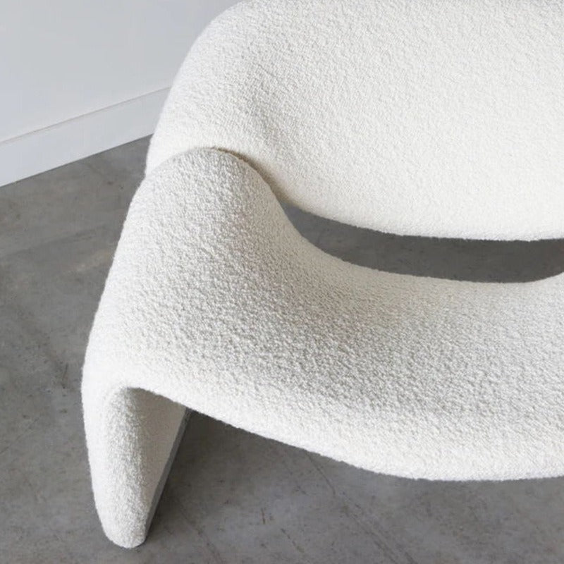Ellington Collection | Sculptural Velvet-Cushioned Velvet Lounge Chair - highlighting material texture and craftsmanship detail in a Mid-Century Modern living room setting.