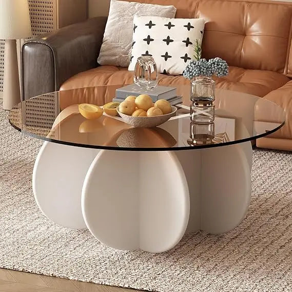 Astoria Collection | Hairpin-Legged Glass-Top Tempered Glass Coffee Table - framed in an editorial still-life composition in a Mid-Century Modern living room setting.