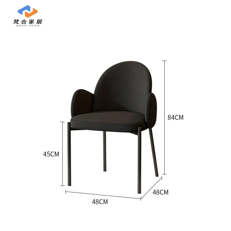 Ellington Collection | Tapered-Leg Curved Walnut Dining Chair - revealing tonal warmth and surface patina under ambient light in a Mid-Century Modern dining room setting.