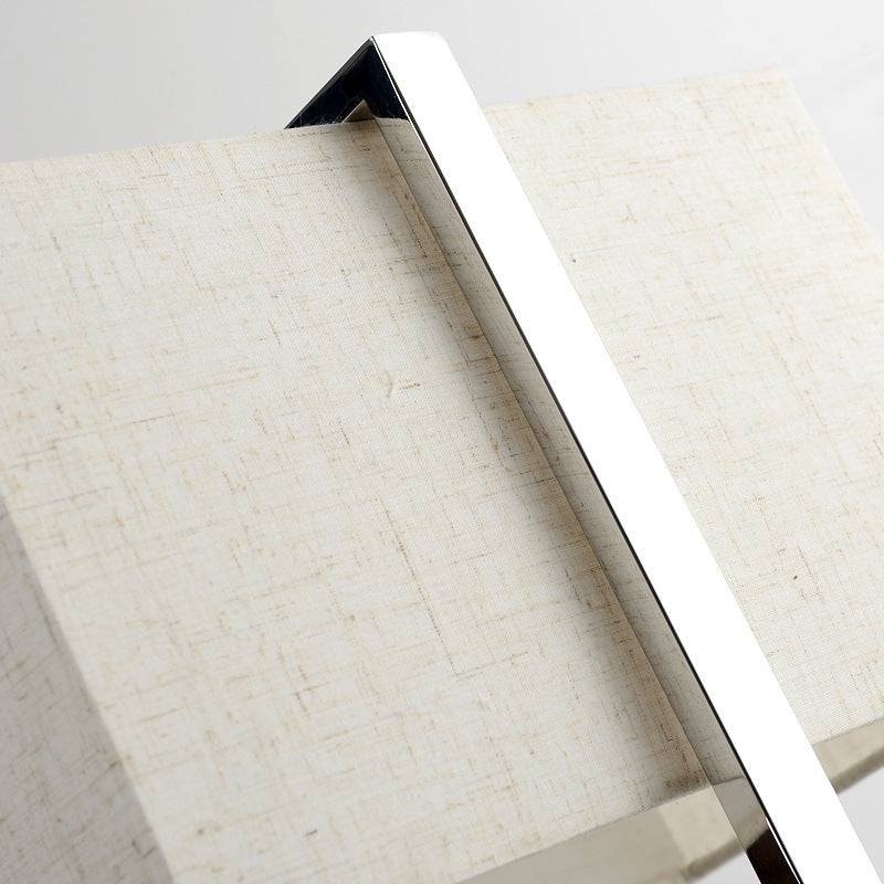 Fontaine Collection | Sculptural Gold-Trimmed Brushed Steel Floor Lamp - featuring close-up joinery and artisanal finish quality in a Mid-Century Modern living room setting.