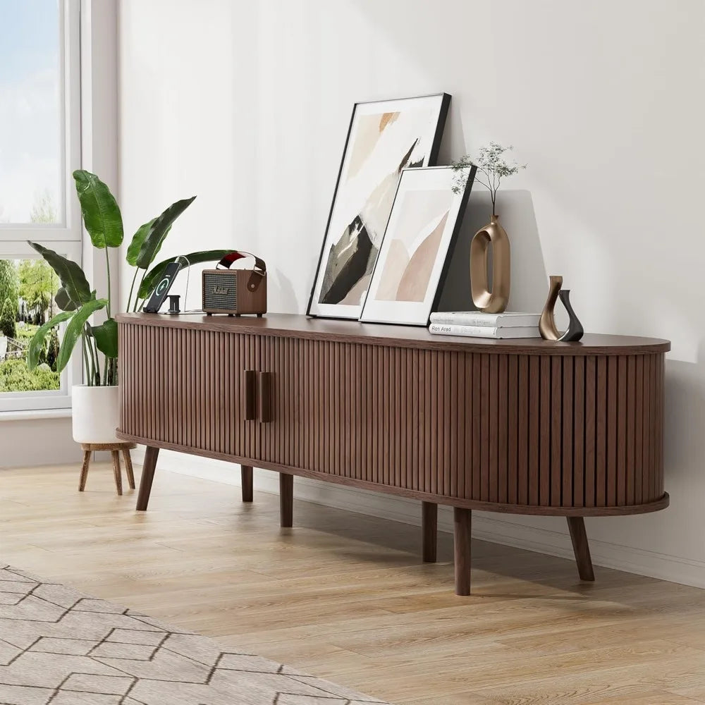 Ellington Collection | Floating Curved Curved Walnut Console - presented at scale within a designed interior in a Mid-Century Modern entryway setting.