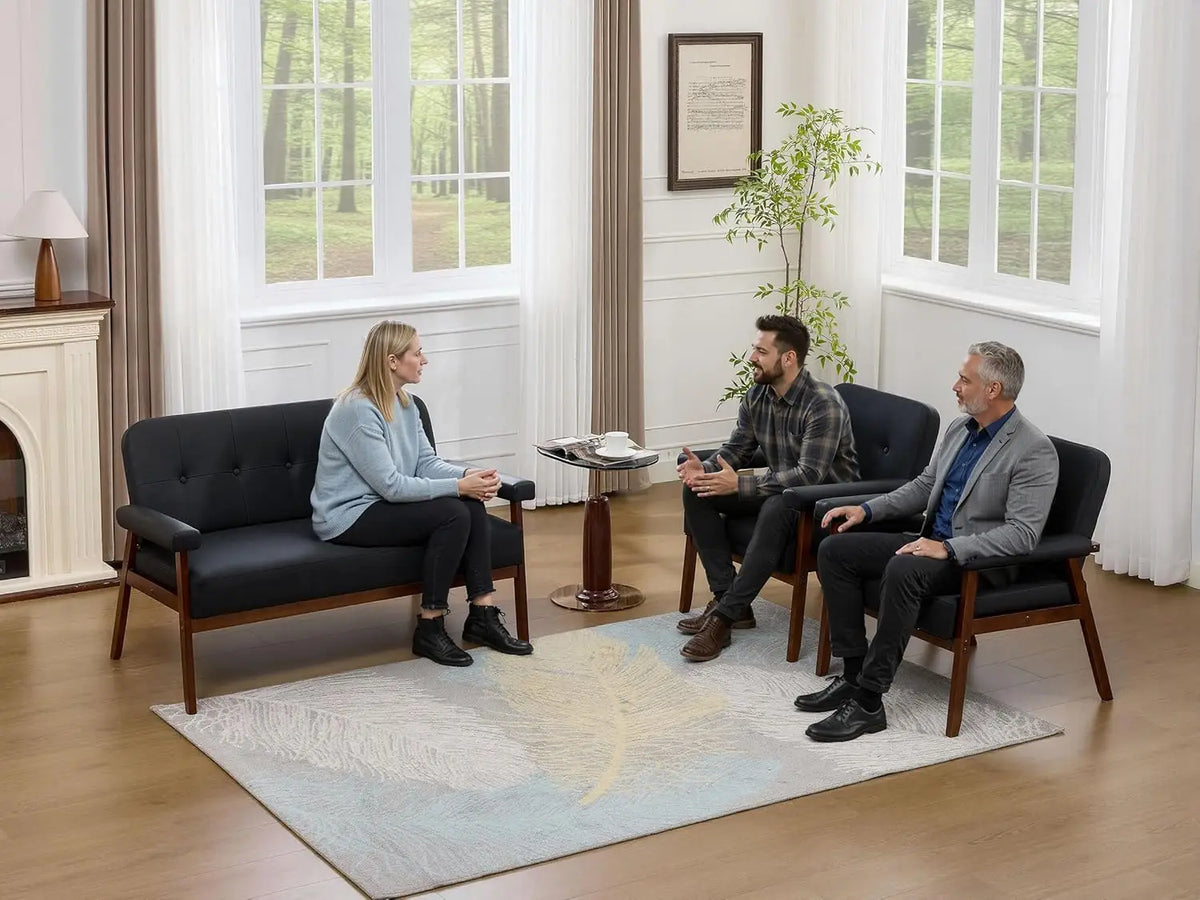 Ellington Collection | Tapered-Leg Leather-Wrapped Obsidian Leather Love Seat Set - highlighting material texture and craftsmanship detail in a Mid-Century Modern living room setting.