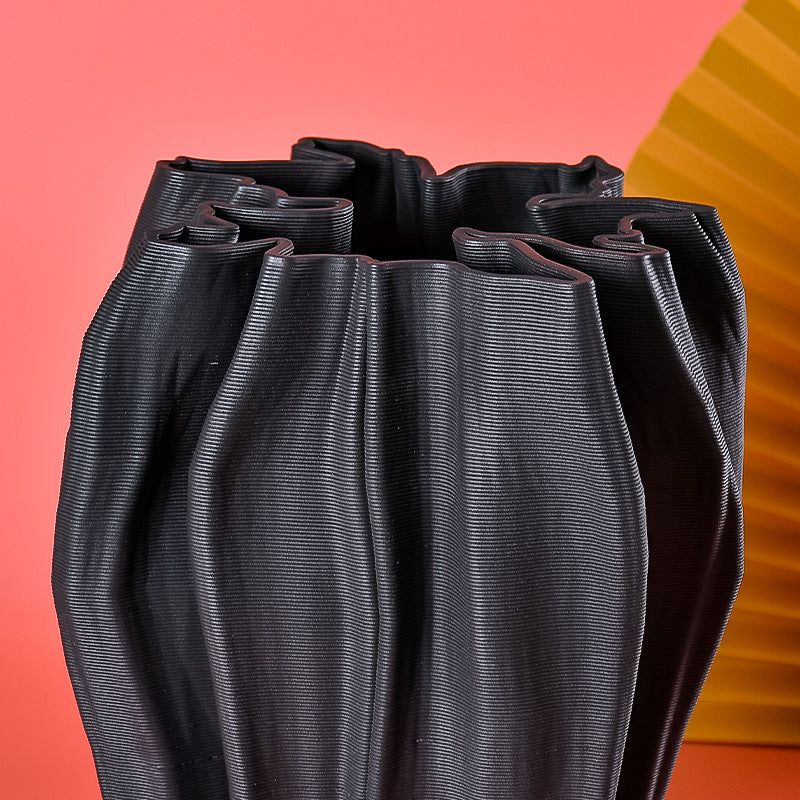 Ellington Collection | Sculptural Atomic-Era Porcelain Vessel - captured in a curated lifestyle vignette in a Mid-Century Modern living room setting.