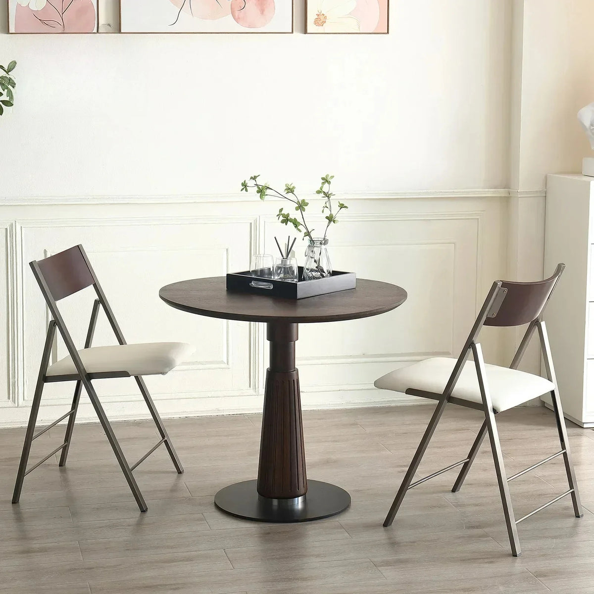 Astoria Collection | Round Walnut & Brass Dining Table - presented at scale within a designed interior in a Mid-Century Modern dining room setting.