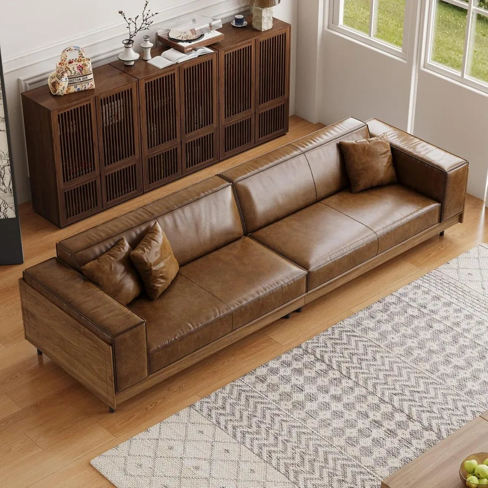 Ellington Collection | Floating Leather-Wrapped Full-Grain Leather & Walnut Lounge Chair - presented at scale within a designed interior in a Mid-Century Modern living room setting.