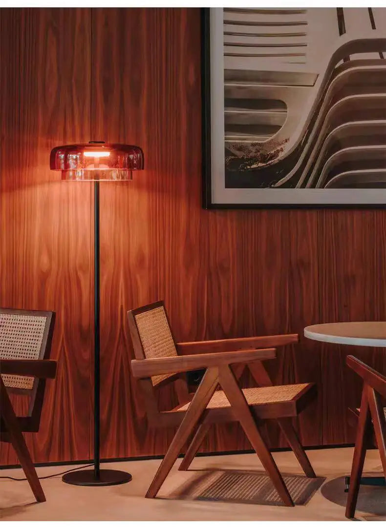 Fontaine Collection | Minimalist Steel-Framed Brushed Steel Floor Lamp - styled from an alternate angle revealing dimensional depth in a Mid-Century Modern living room setting.