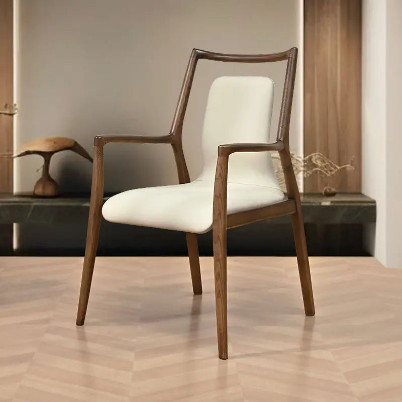 Ellington Collection | Floating Brass-Accented Walnut Armchair - showcasing form and function in daily use context in a Mid-Century Modern living room setting.