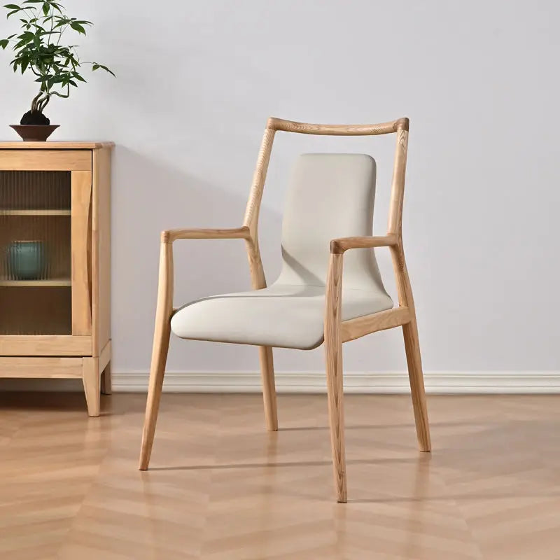 Ellington Collection | Floating Brass-Accented Walnut Armchair - exhibiting shadow play and geometric silhouette detail in a Mid-Century Modern living room setting.