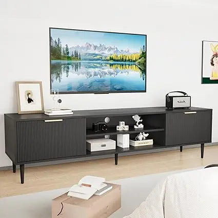 Dresden Collection | Tapered-Leg Steel-Framed Ebony Console - framed in an editorial still-life composition in a Mid-Century Modern entryway setting.