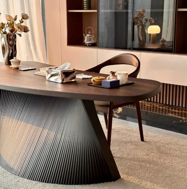 Astoria Collection | Tapered-Leg Oval Walnut Oval Coffee Table - captured in a curated lifestyle vignette in a Mid-Century Modern living room setting.