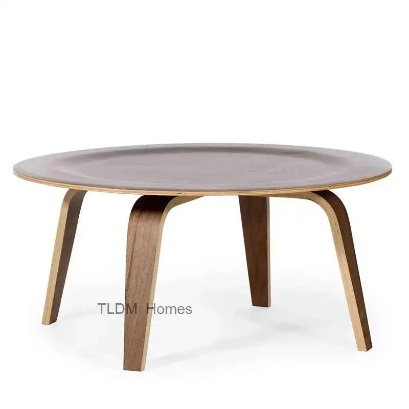 Dresden Collection | Geometric Circular Nordic Round Wood Coffee Table - presented at scale within a designed interior in a Mid-Century Modern living room setting.
