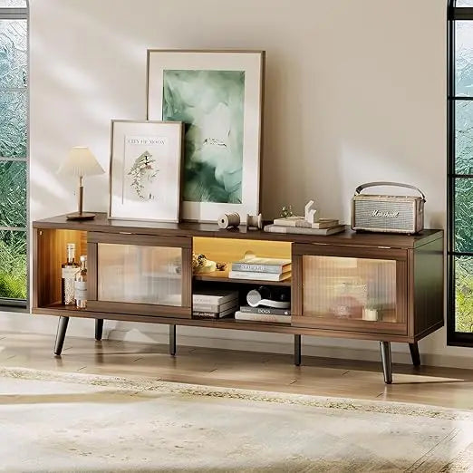 Harlow Collection | Floating California Walnut TV Stand with LED Lighting - framed in an editorial still-life composition in a Mid-Century Modern living room setting.
