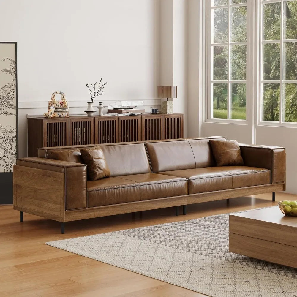 Ellington Collection | Floating Leather-Wrapped Full-Grain Leather & Walnut Lounge Chair - captured in a curated lifestyle vignette in a Mid-Century Modern living room setting.