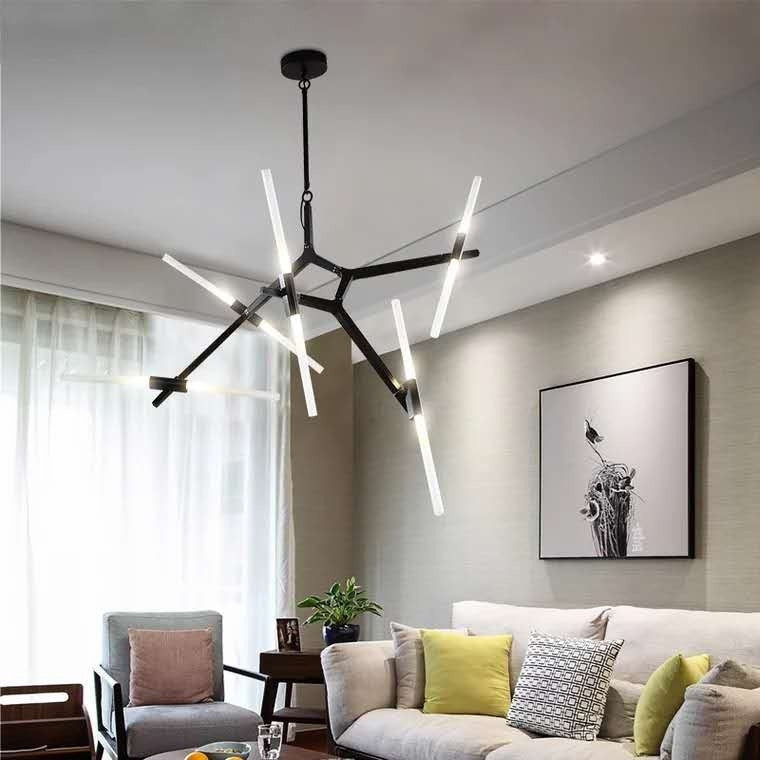 Ellington Collection | Geometric Atomic-Era Herringbone Branch Chandelier - styled from an alternate angle revealing dimensional depth in a Mid-Century Modern living room setting.