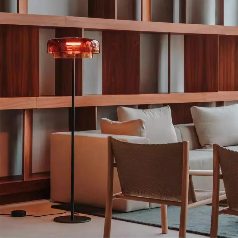 Fontaine Collection | Minimalist Steel-Framed Brushed Steel Floor Lamp - revealing tonal warmth and surface patina under ambient light in a Mid-Century Modern living room setting.
