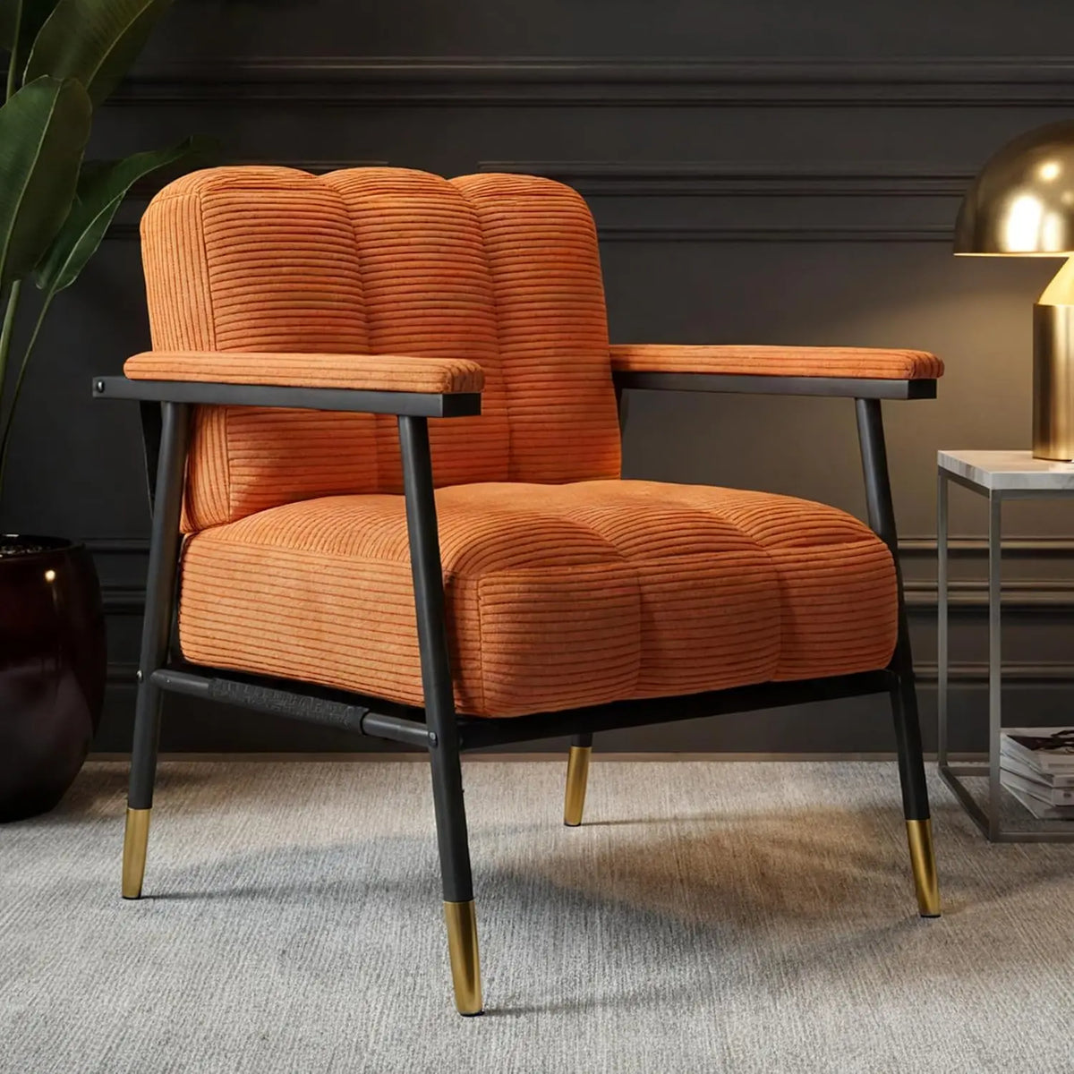 Valencia Collection | Sculptural Chrome-Detailed Corduroy & Chrome Accent Chair - revealing tonal warmth and surface patina under ambient light in a Mid-Century Modern living room setting.