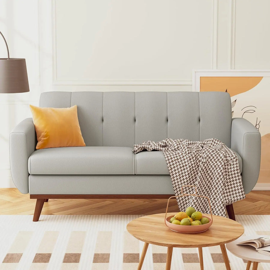 Ellington Collection | Atomic-Era Walnut Loveseat - showcasing full sculptural form and curated finish in a Mid-Century Modern living room setting.