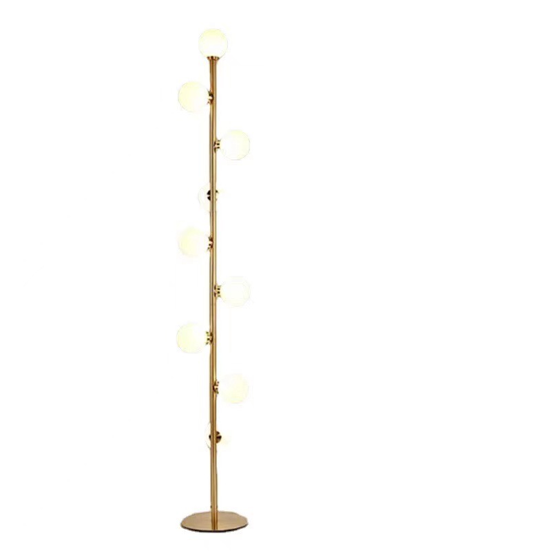 Astoria Collection | Geometric Brass-Accented Walnut & Brass Floor Lamp - featuring close-up joinery and artisanal finish quality in a Mid-Century Modern living room setting.