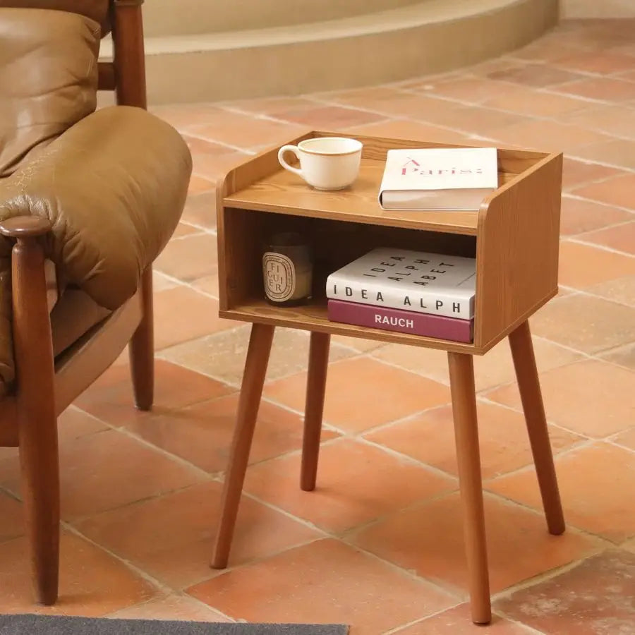Fontaine Collection | Tapered-Leg Brass-Accented Walnut Nightstand - presented at scale within a designed interior in a Mid-Century Modern bedroom setting.