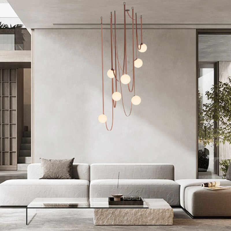 Dresden Collection | Floating Brass-Accented Brass & LED Chandelier - styled from an alternate angle revealing dimensional depth in a Mid-Century Modern living room setting.