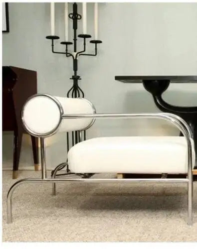 Fontaine Collection | Sculptural Atomic-Era Walnut Recliner - showcasing form and function in daily use context in a Mid-Century Modern living room setting.