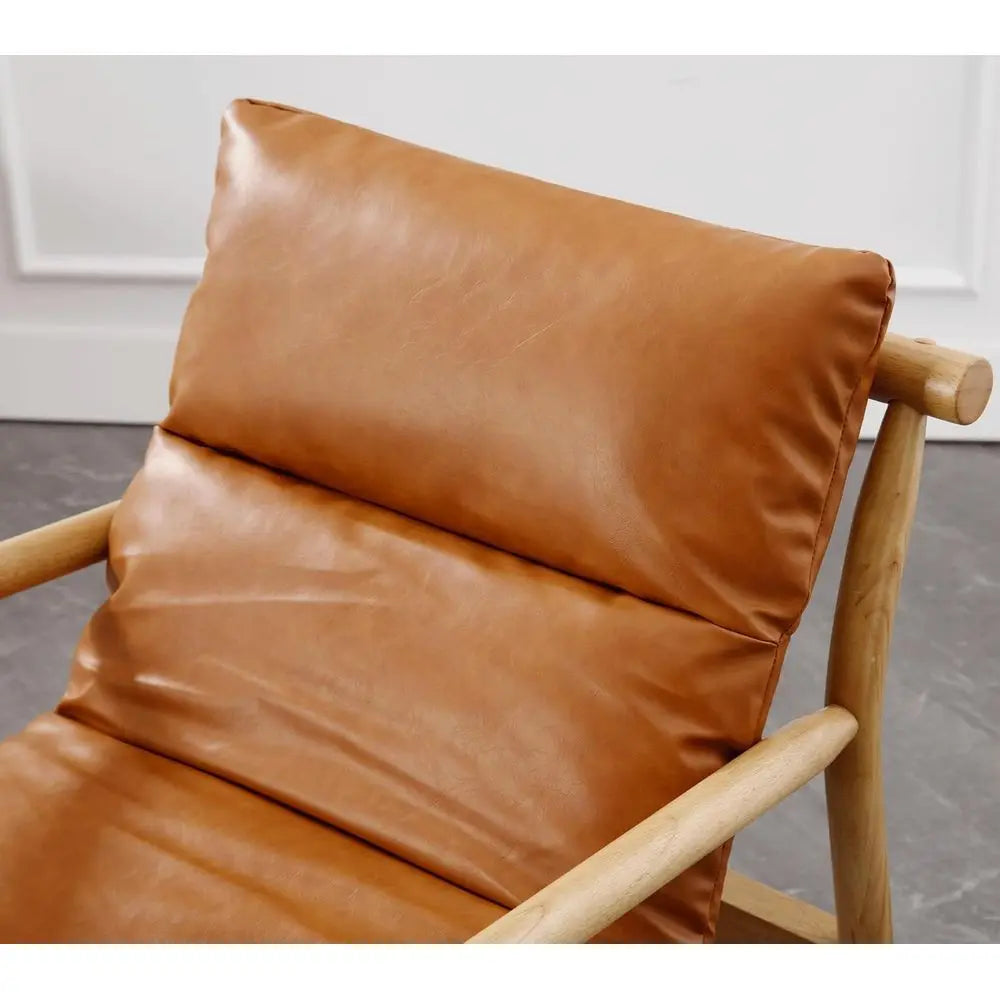 Ellington Collection | Geometric Leather-Wrapped Vegan Leather Armchair - presented at scale within a designed interior in a Mid-Century Modern living room setting.