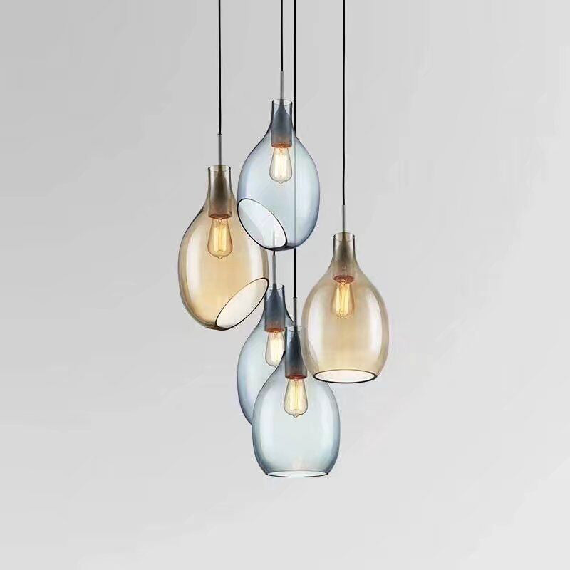 Dresden Collection | Sculptural Brass-Accented Crystal Pendant - highlighting material texture and craftsmanship detail in a Mid-Century Modern living room setting.