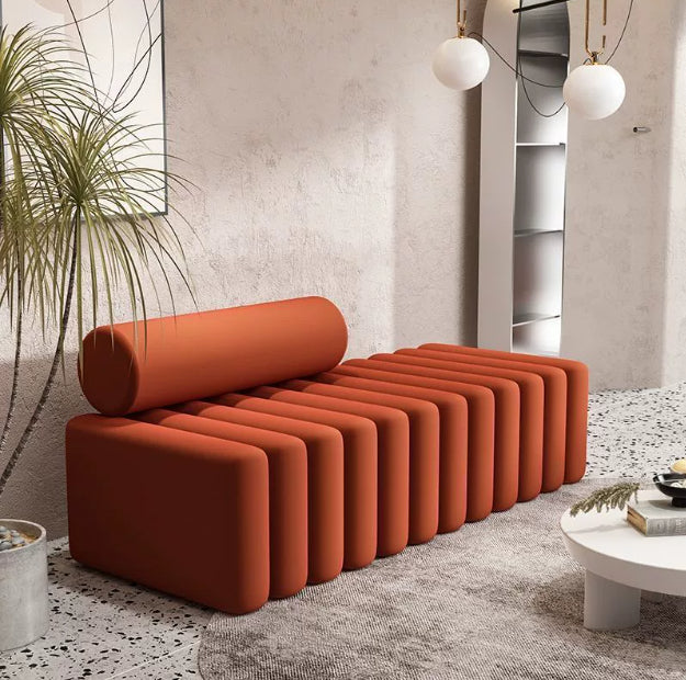 Ellington Collection | Tapered-Leg Brass-Accented Walnut Storage Bench - exhibiting shadow play and geometric silhouette detail in a Mid-Century Modern living room setting.