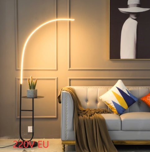 Ellington Collection | Sculptural Glass-Topped Walnut & Brass LED Bedside Lamp - styled from an alternate angle revealing dimensional depth in a Mid-Century Modern bedroom setting.
