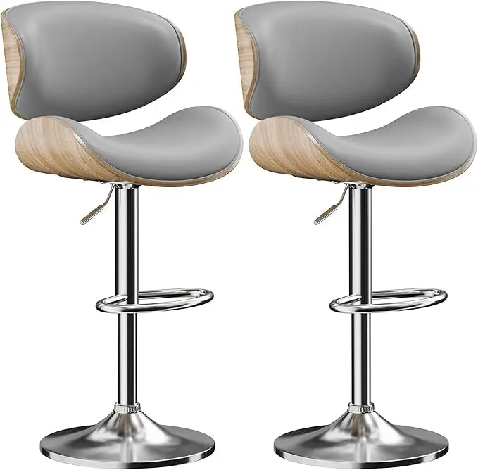Fontaine Collection | Arched Leather-Wrapped Swivel Stools - framed in an editorial still-life composition in a Mid-Century Modern living room setting.