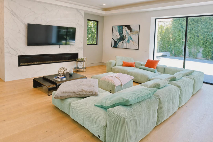 Belmont Collection | Tapered-Leg Atomic-Era Master Lounge Sofa - showcasing full sculptural form and material finish in a Mid-Century Modern living room setting.