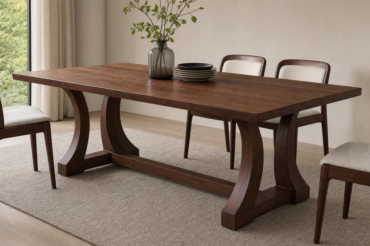 Astoria Collection | Tapered-Leg California Walnut & Brass Dining Table - showcasing full sculptural form and material finish in a Mid-Century Modern dining room setting.