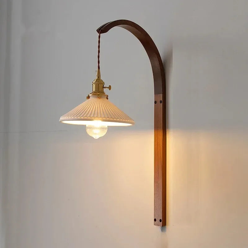 Fontaine Collection | Geometric Japanese-Inspired Walnut Wall Light - showcasing full sculptural form and curated finish in a Mid-Century Modern living room setting.
